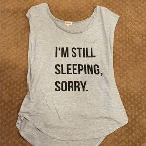 Light gray “I’m Still Sleeping, Sorry.” tank top.